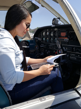 student in a cockpit