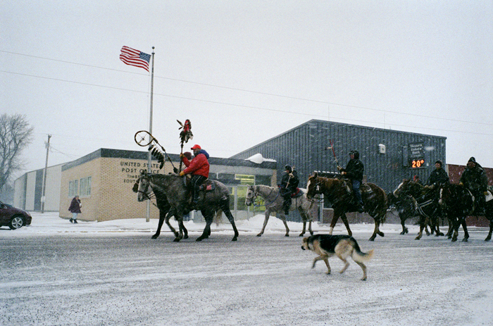 The Timber Lake Post Office with group ride horses