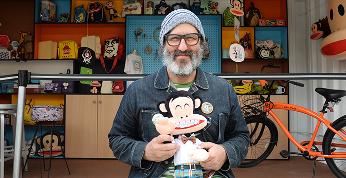 Paul Frank holding Julius the Monkey at the OCC Box Event