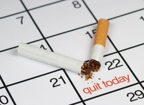 Broken Cigarette on Quit Today on a Calendar